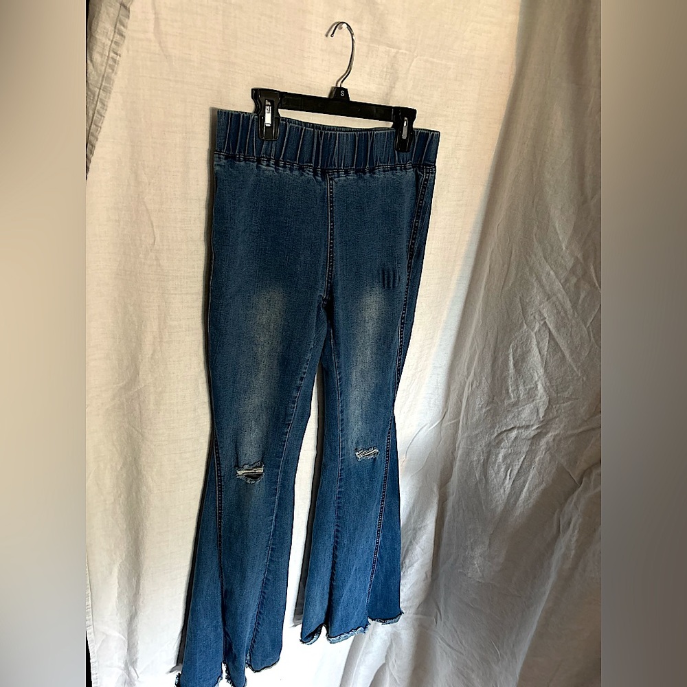 Flared jeans. Brand unknown.